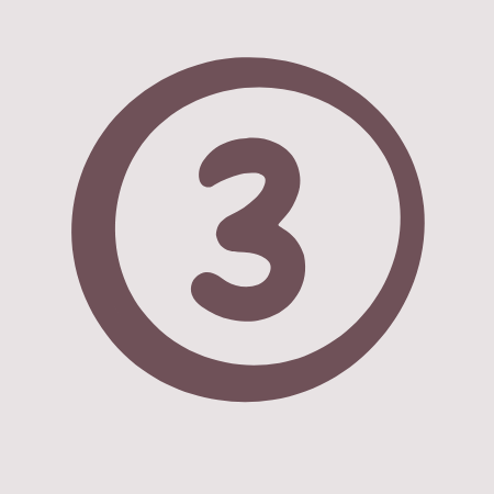 3 Eine große, braune Zahl „3“ innerhalb eines Kreises.